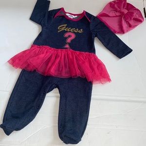 Guess baby girls one piece with matching hat. Size 6-9 months.